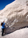 Collecting sample of volcanic ash