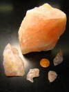 Rose quartz and conchoidal fracture fragments
